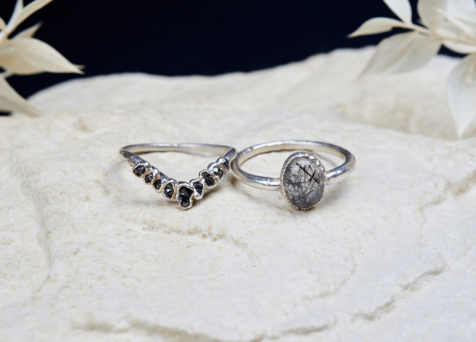 Black rutilated quartz ring set with raw black diamonds | Bernadette